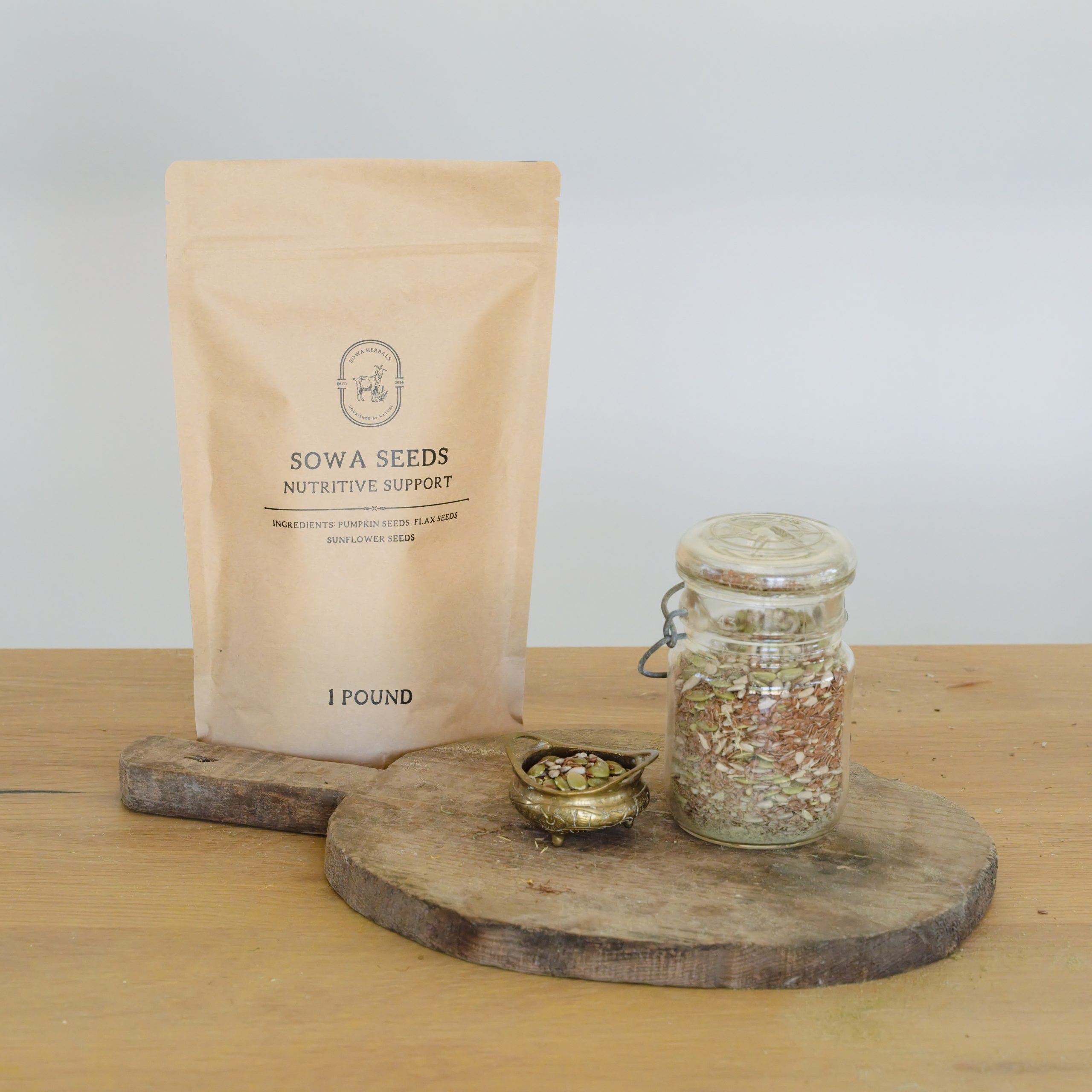 Sowa Seeds Nutritive Support for goats, image with a product and jar of seeds